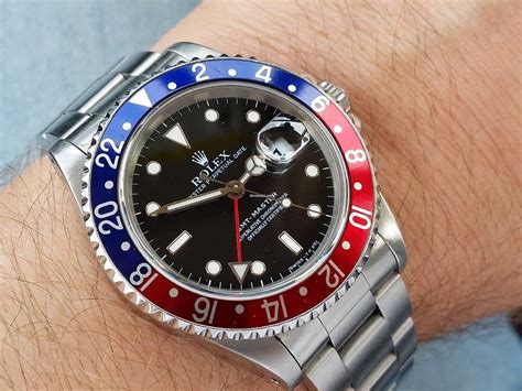 blue and red tnt rolex submariner|rolex submariner with red letters.